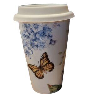 Lenox, butterfly meadow 10 oz ceramic travel mug with silicone lid.